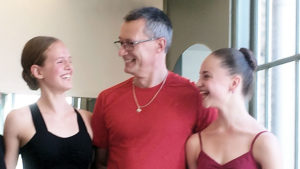 Wim Broeckx with two ballet students in The Hague